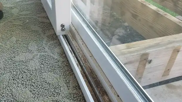 How to Fix a Sliding Glass Door Track that Fills With Water