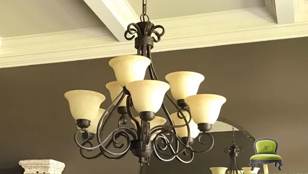 Use a Decorative Light Fixture to Cover the Door