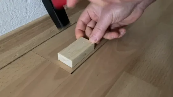 Should I fill small cracks in the hardwood floor